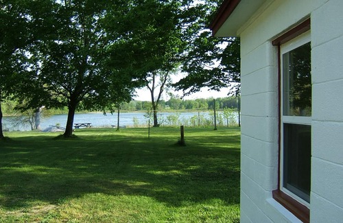 Three Rivers Cottage | Fireside Cottage - Lakefront Cottages On Semi-private Lake, Beach, Boats, Fun!