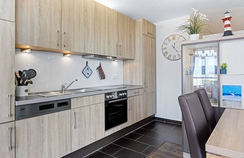 Wremen Apartment | First-class apartment with great sea views, sauna and two balconies!