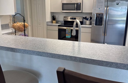 White Marsh House | First coffee, then pool, beaches, fishing, golf, dolphins .