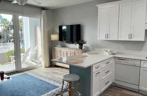 Gulf Place Condo | First floor condo overlooking the heated pool. Steps from the private beach!