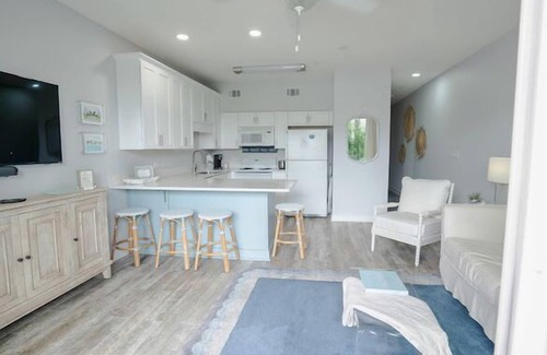 Gulf Place Condo | First floor condo overlooking the heated pool. Steps from the private beach!