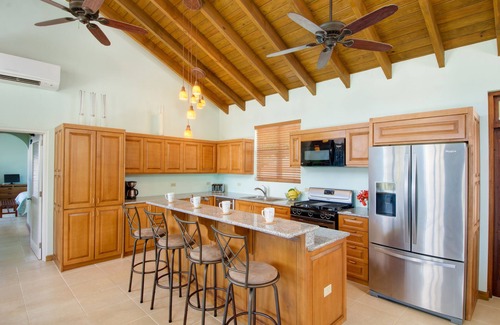 Belmont Villa | FLAMINGO SUNSET - heavenly sunsets, strolls to the beach & fun in the pool!
