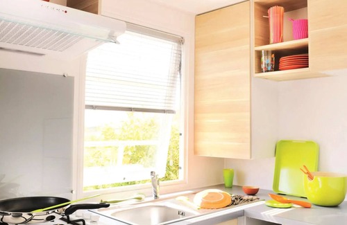 Treignac House | Flower Camping La Plage * - Mobil home Comfort 31m2 (3 bedrooms) + TV + semi-covered terrace of 18 m2 8 people