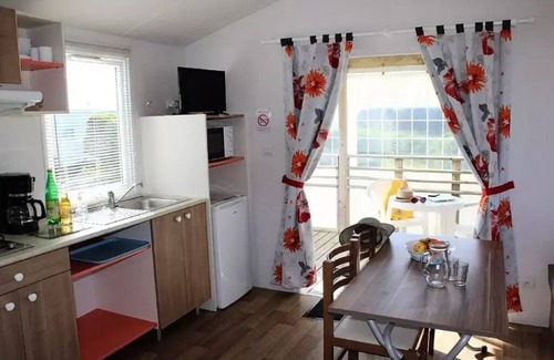 Kerroch House | Flower Camping La Pointe du Talud * - Mobile home Comfort NEPTUNE 25m2 - 1 bedroom + covered terrace 9m2 2 people