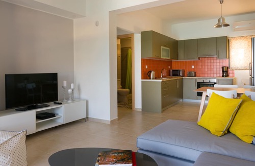 Agios Nikolaos Apartment | Footsteps to the beach!
