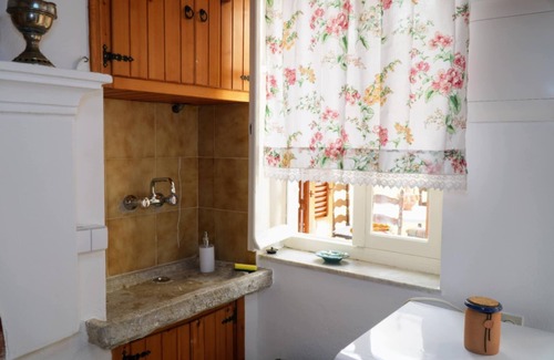 Pedi House | Fotini’s Place – Traditional 1907 Stone Home by the Sea in Symi