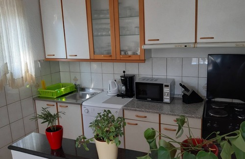Kampor Apartment | Four-bedroom apartment with terrace and sea view Kampor, Rab (A-5051-b)