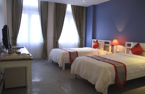 Daun Penh Bed & Breakfast | Frangipani Royal Palace- Deluxe Room