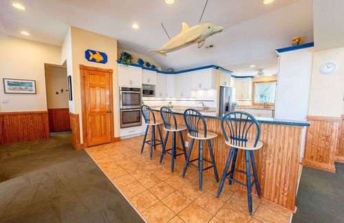 Buck Island House | Free pool heat, hot tub, elevator, chefs kitchen, gated community with tennis, lap pools, ocean f.