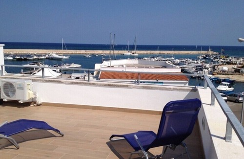 Marina di Ostuni Apartment | Fresh renov. Penthouse, sea views, right on the fishing port, 50 m sea