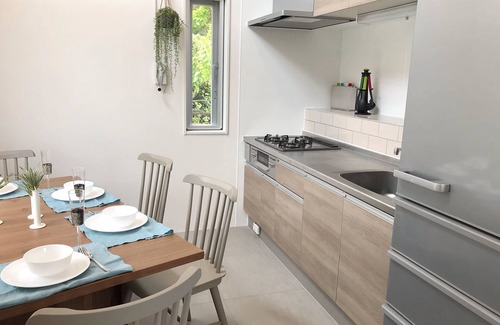Kadena-cho Condo | Front Field Senanami chartered building Condominium with BBQ grill, ocean view, close to the beach.