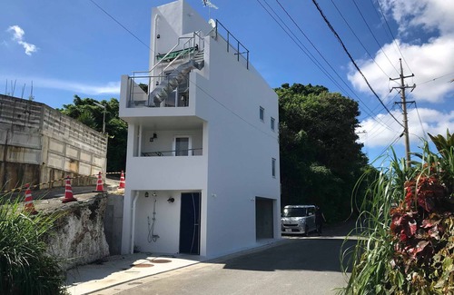 Kadena-cho Condo | Front Field Senanami chartered building Condominium with BBQ grill, ocean view, close to the beach.