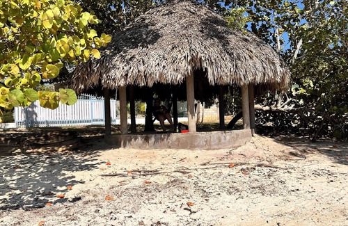 Little Bay Cottage | Fruit Tree Beach Cottage, Bar and Grill with private beach and beautiful sunsets