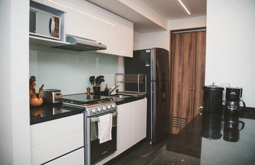 Hipodromo Condesa Apartment | Fully equipped kitchen, internet, comfy beds, business lounge, swim lane.