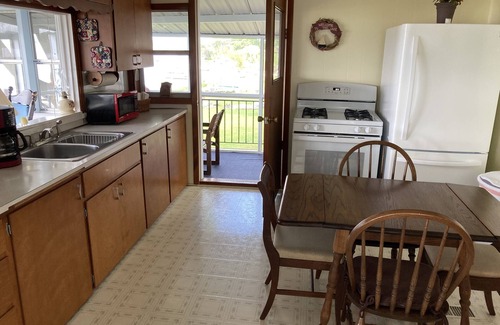 Greenville Cabin | Fully furnished cabin overlooking scenic Wabasis Lake