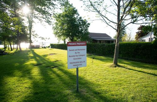 Lindsay House | Fun Place with a Sandy Beach for Swimming, Boating & Fishing, Featuring 1 House and 3 Cabins