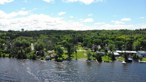 Lindsay House | Fun Place with a Sandy Beach for Swimming, Boating & Fishing, Featuring 1 House and 3 Cabins
