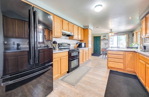 Manawa House | Furnished Deck w/Forested Views: Manawa Home!
