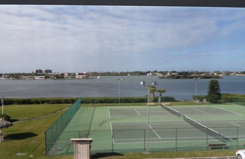 Largo Condo | Furnished One Bedroom Condo. Water View, Heated Pool,remodeled marble bathroom.