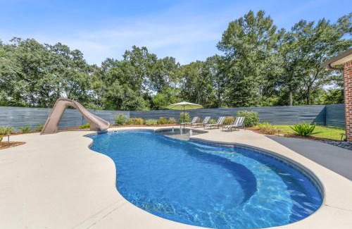 Youngsville House | Gameday Getaway - Pool - King Bed - Sports Complex