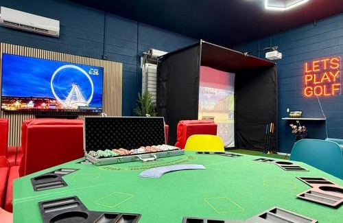 Van Valzah House | Gameroom! Golf Simulator! Beach! Movie Theater!