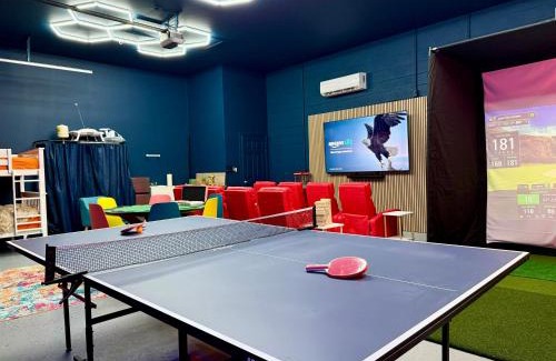 Van Valzah House | Gameroom! Golf Simulator! Beach! Movie Theater!
