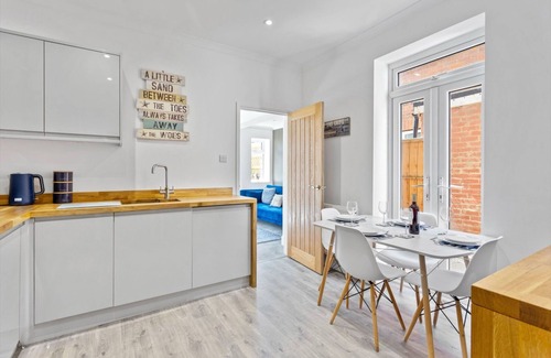 Hythe Apartment | Garden apartment with parking seconds from beach!