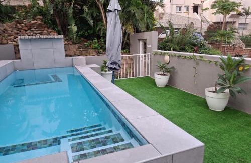 Umhlanga House | Garden Facing Upstairs En-Suite Bedroom In Main House