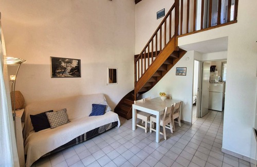 Tamaris Apartment | Garden with barbecue, swimming pool