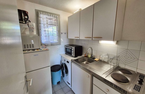 Tamaris Apartment | Garden with barbecue, swimming pool