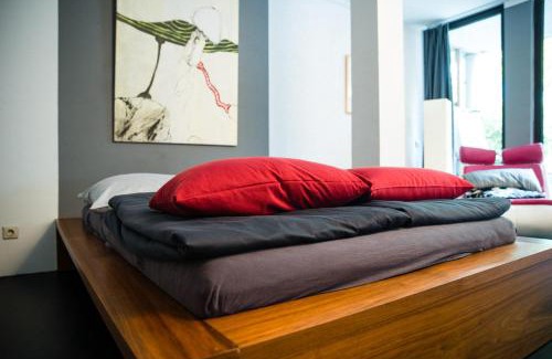 Ehrenfeld House | Gartenzimmer in Atelierwohnung