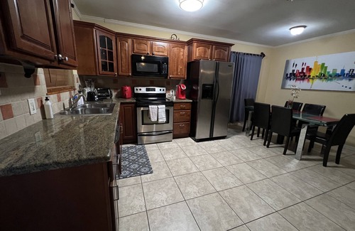 Highland Garden Villa | Gated Furnished WiFi Netflix vacation home 2 bed1 bath near beaches golf casino