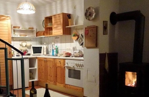 Zandt Apartment | Gemütliches Ferienhaus mit Holzsauna, Holzkaminofen und Garten