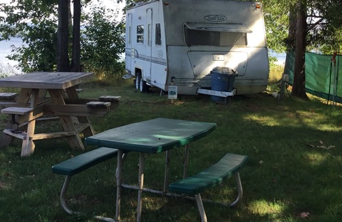 Michigan House | Get lulled to sleep by Lake Superior in Vintage camper 5 steps from the water