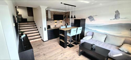 Niedersfeld Apartment | Gipfelpanorama Winterberg mit Berg- und Seeblick, Boxspringbett mit ausfahrbarem TV