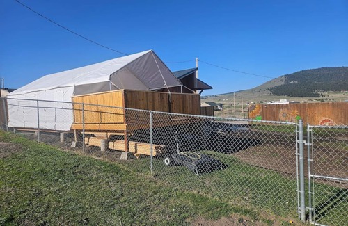 Big Arm RV Rental | GlampCamp - Luxury Wall Tent & Bathhouse