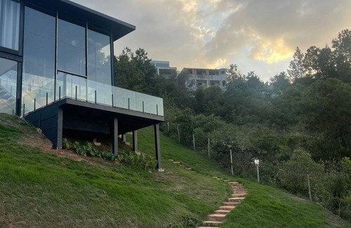 Sao Sebastiao das Aguas Claras House | Glass house on the mountain in Macacos, close to waterfalls and ecological trails