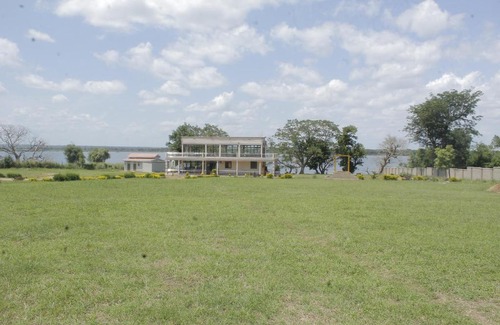 Pakwach Hotel | Global village Resort, Pakwach