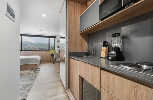 Guayabal Apartment | Go Living 1015 · Cozy Loft apt, kitchenette and AC with coworking
