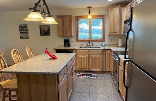 Arkdale Condo | Golf Cart available! Gorgeous Golf & Lake Condo with heated pool