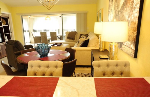 Lake Wales Condo | Golf course, pool, hot tub, and tennis courts: Lake Wales Country Club oasis