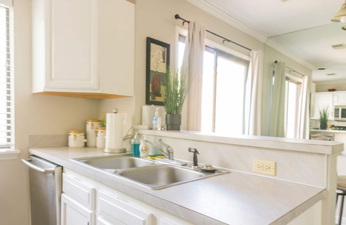 Raintree House | Gorgeous 2bd 1.5ba Townhome on Golf Course. 2 Queen beds and a sleeper sofa.