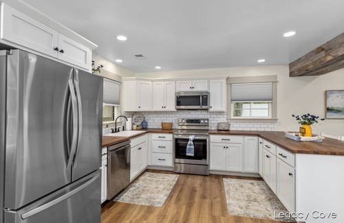 Greenville Cottage | Gorgeous Cottage on Wabasis Lake. Pontoon included & pet friendly!
