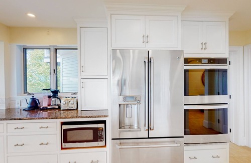 Charlotte House | Gorgeous home with amazing lake views, fireplace, firepit, hot tub, & balcony