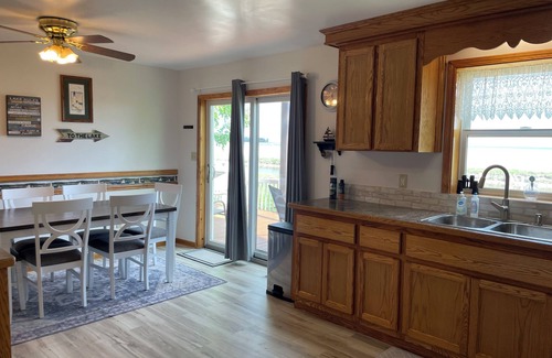 Au Gres House | Gorgeous Lakeside Vacation Home For Water Sports, Fishing, Boating and Hiking.