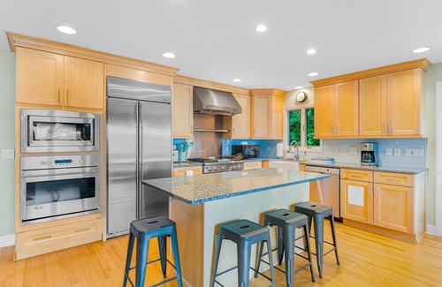 North Lake George House | Gorgeous lakeview retreat with wraparound porch, wood stove, & WiFi - dogs OK