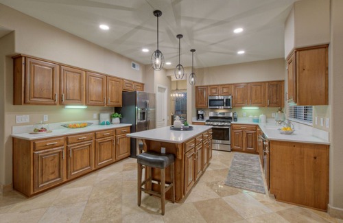 Crystal Shores House | GORGEOUS Val Vista Lake VIEW: Htd PVT POOL, Spa, Putt Green, Kayaks, Bikes, Fishing