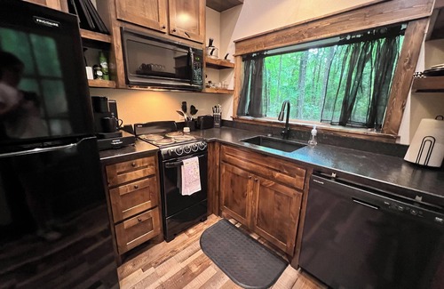 Muse Cabin | Grab your ATV, hiking boots, or a good book and escape to nature.