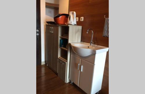 Bekasi Timur Apartment | Grand Dhika Apartement by 2325 Studio room with cozy wooden style room