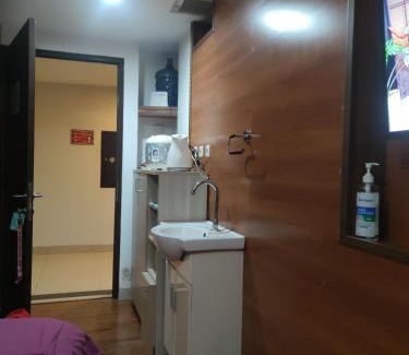 Bekasi Timur Apartment | Grand Dhika Apartement by 2325 Studio room with cozy wooden style room